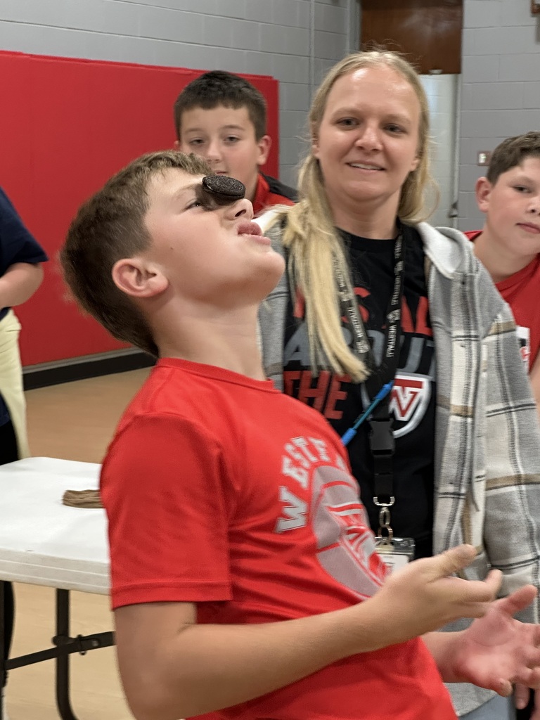 Student playing Minute to Win it games