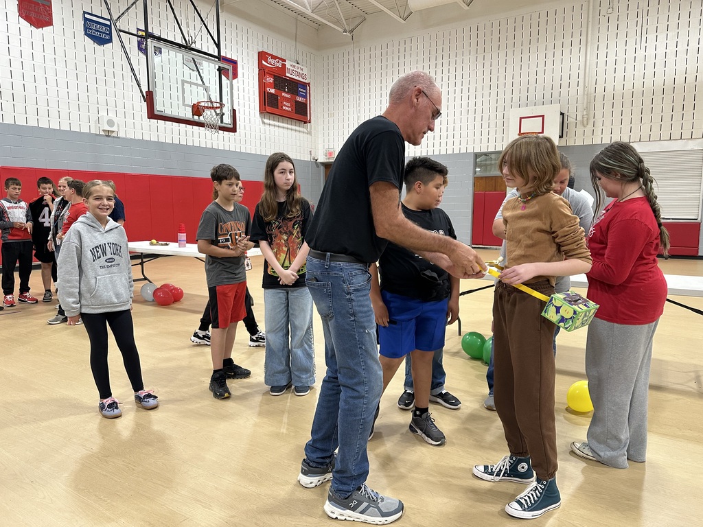 Student playing Minute to Win it games