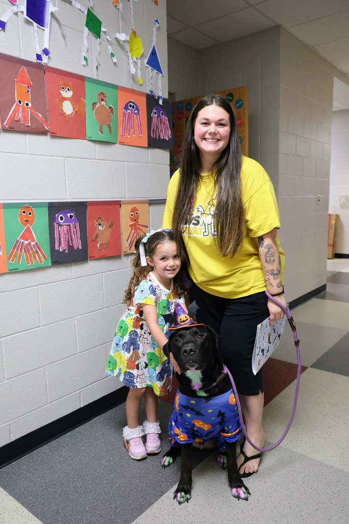 Mom, daughter, and puppy