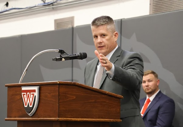 Superintendent Jason Fife speaking at the podium
