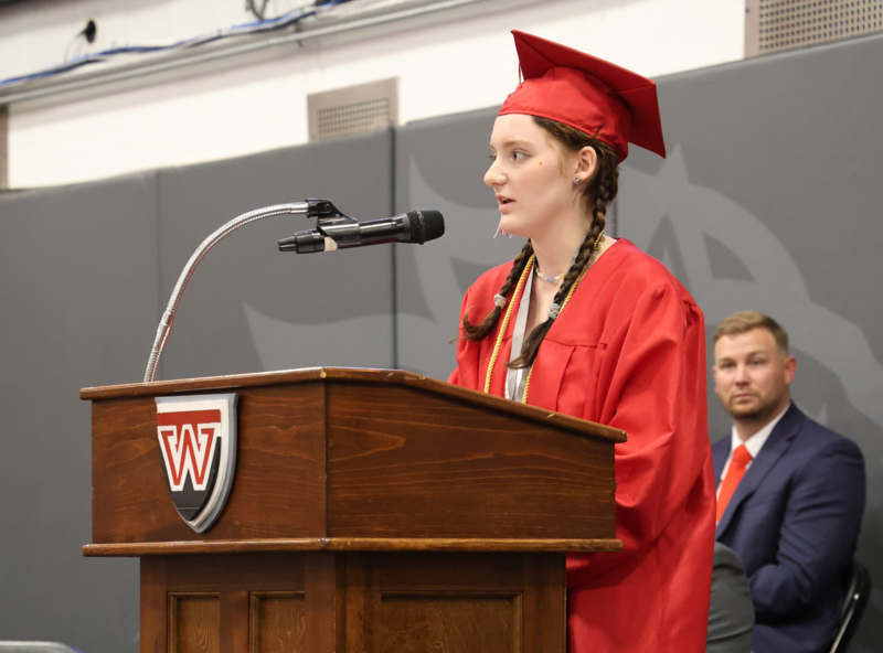 Kathryn Lockhart speaking at podium