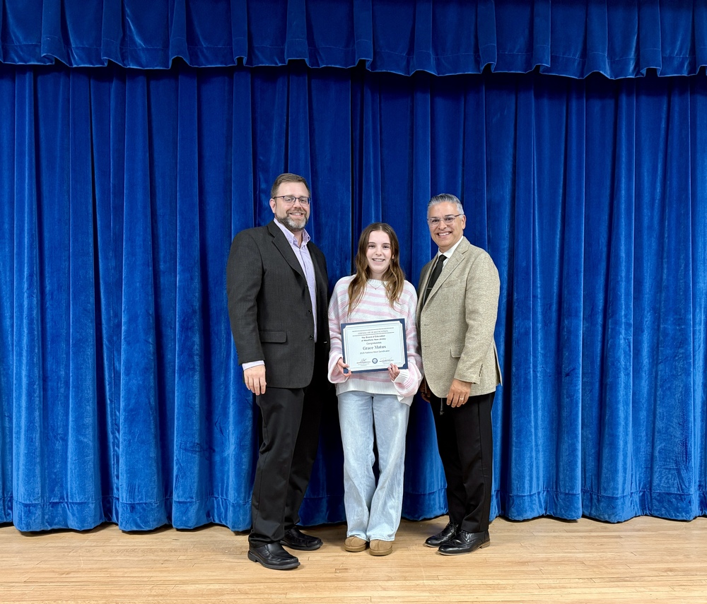 BOE President with student and Westfield Superintendent