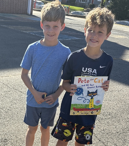 Two Wilson students with book