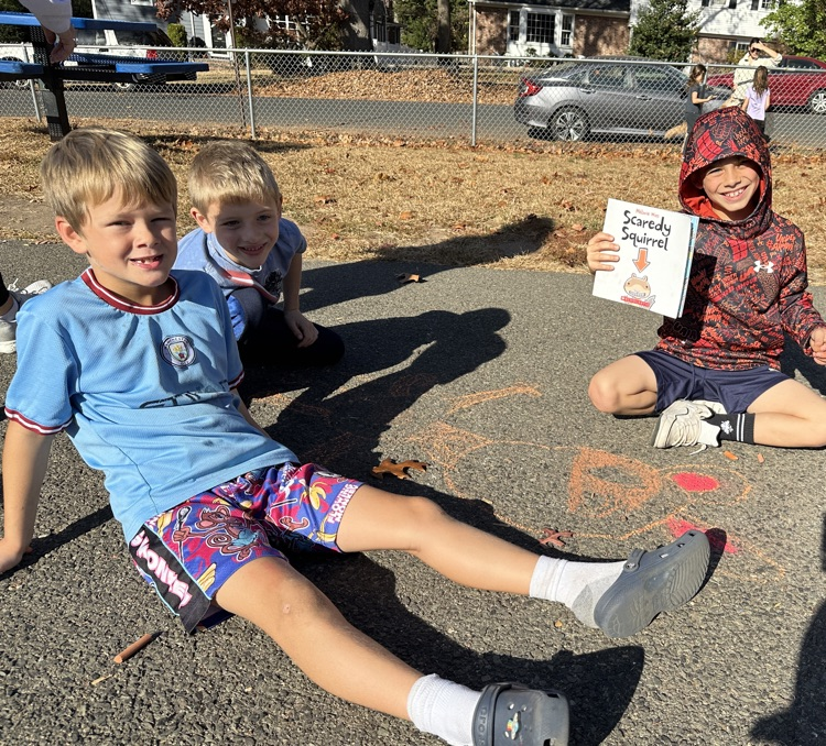 Wilson reading buddies on blacktop