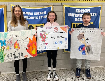 Edison students hold up their winning anti-vaping posters