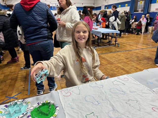 Wilson student working on holiday craft