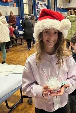 Wilson student working on holiday craft