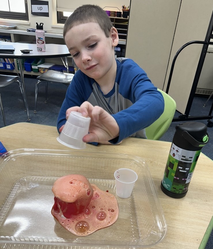 Student doing science lesson