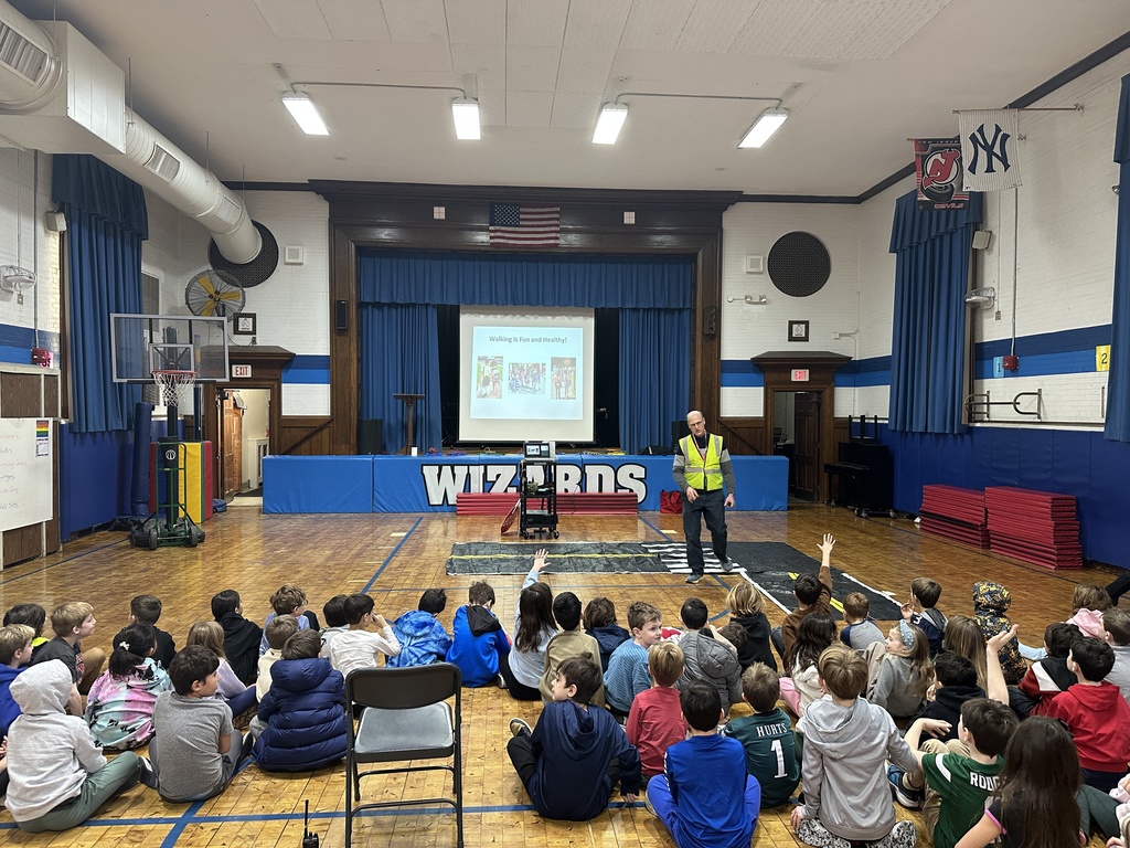 second grade students sitting during assembly