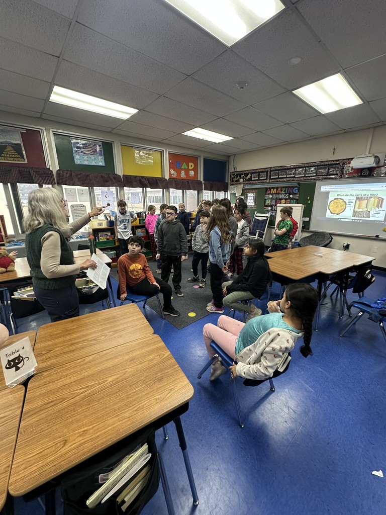 Presenter engages students in a discussion.