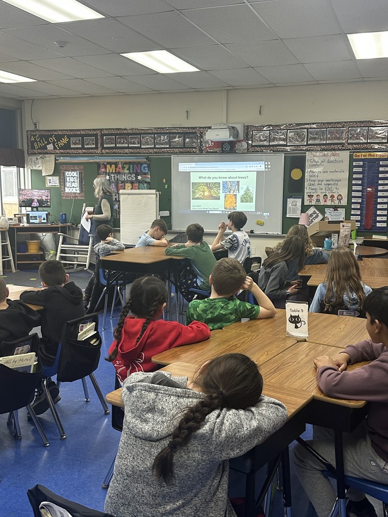Presenter engages students in a discussion.