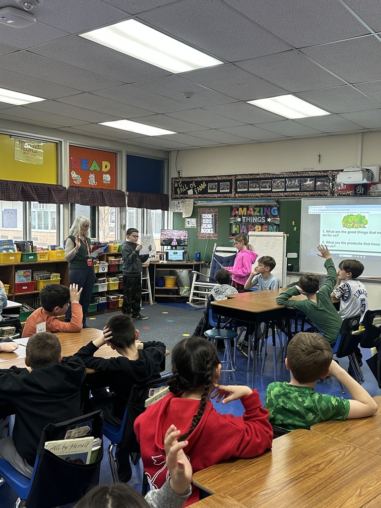 Presenter engages students in a discussion.