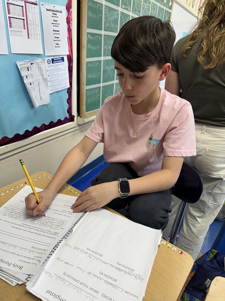 Wilson student working on their opinion essay
