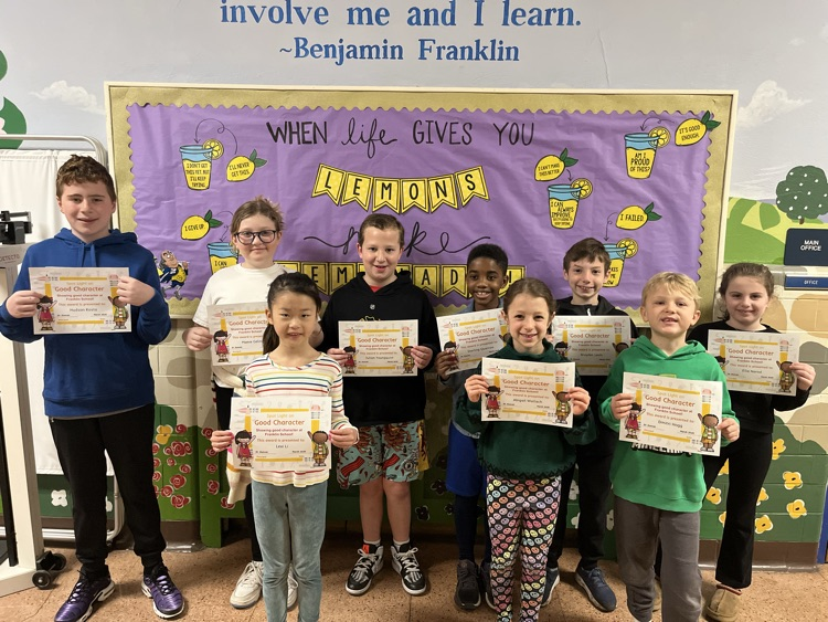 Group photo of students holding certificates
