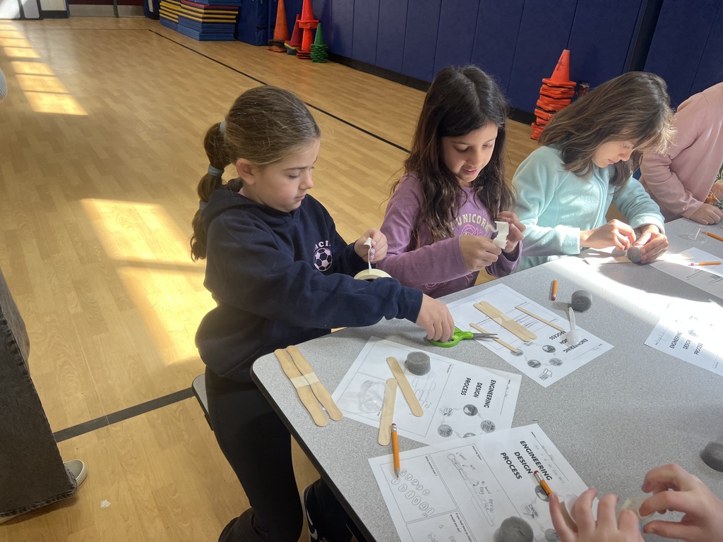 Students making catapults.