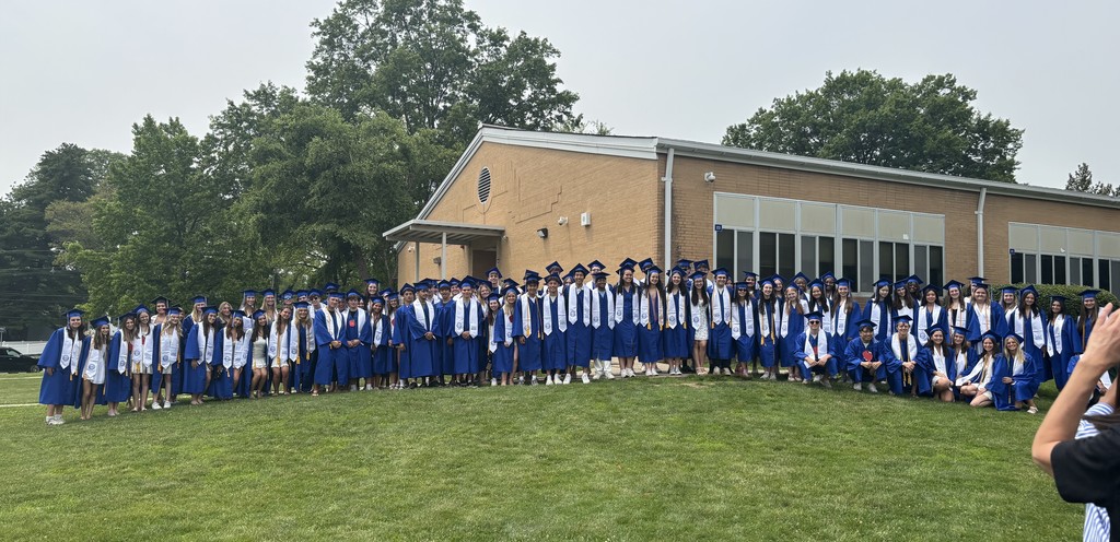 Group shot of 12th graders in cap and gown at Jefferson