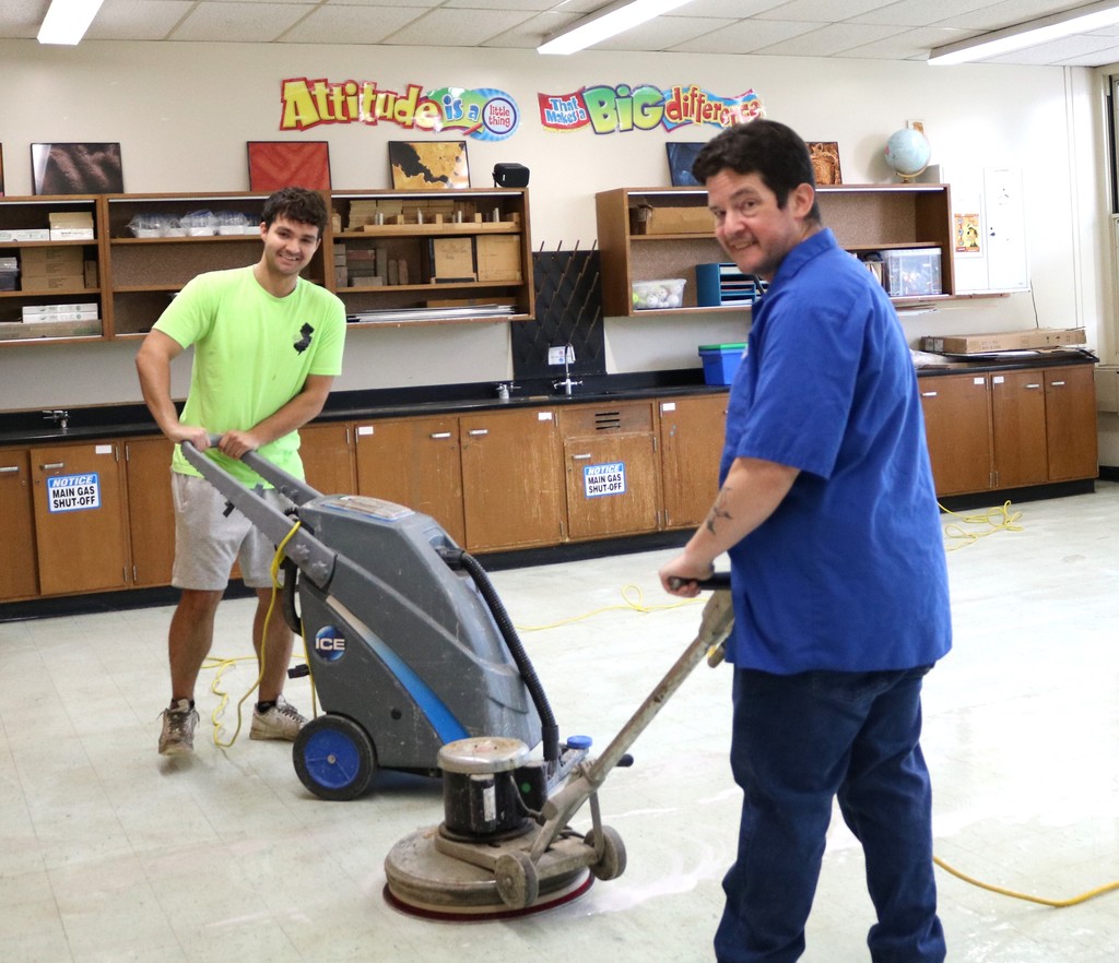 Custodians cleaning floors