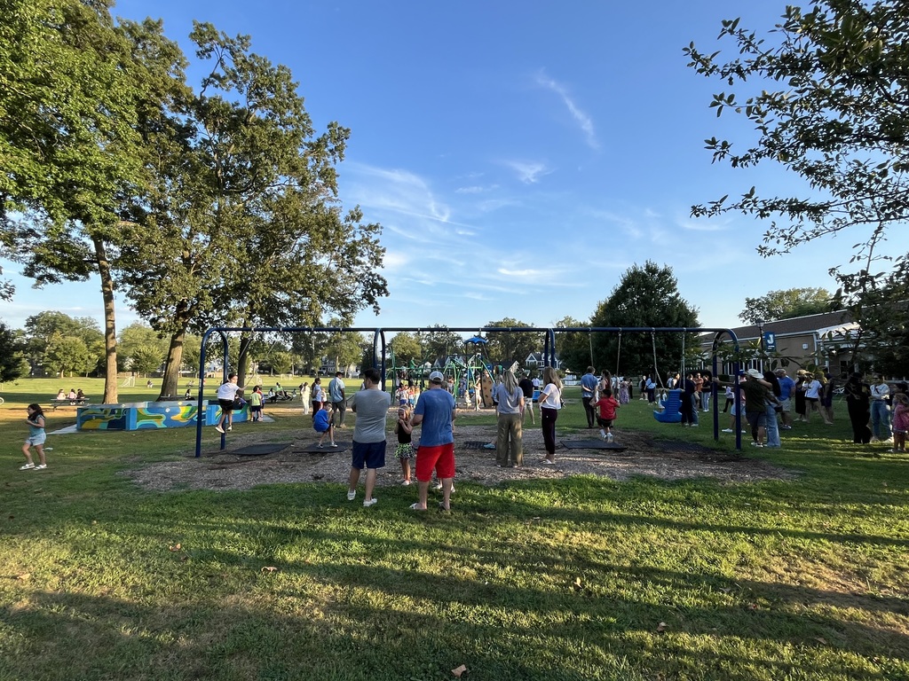 Students and families enjoying the nice evening out. 