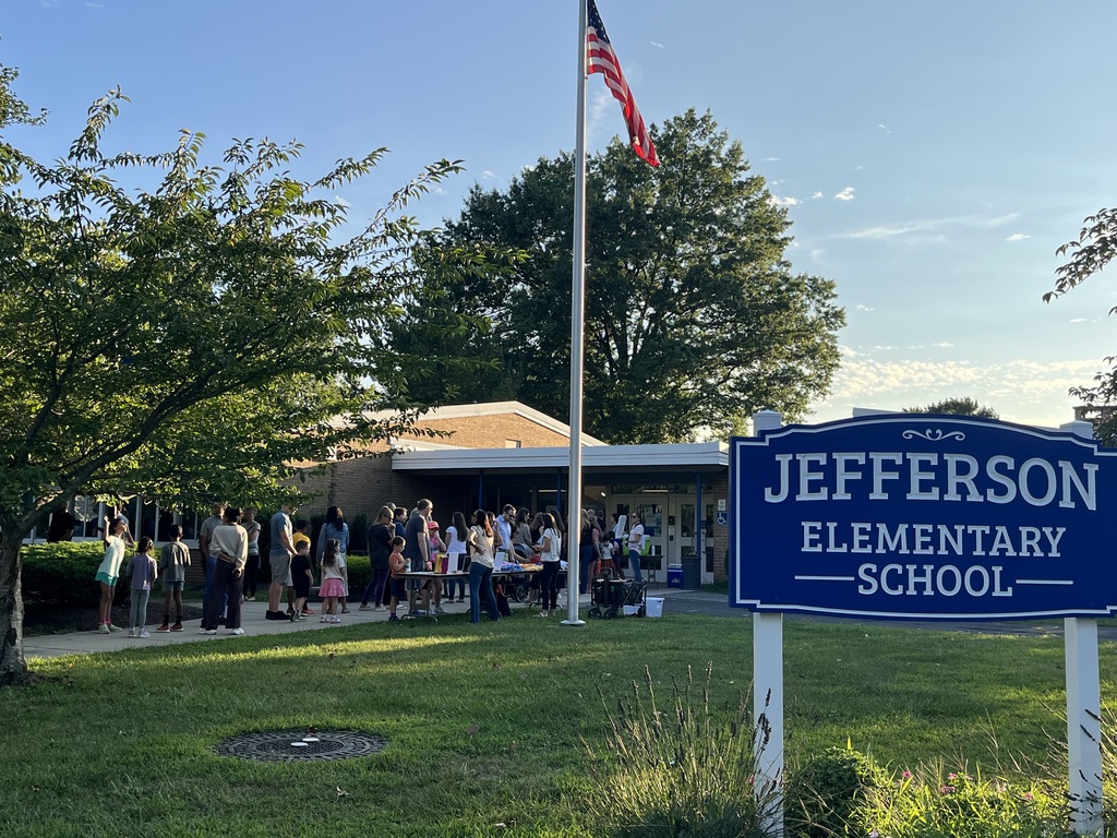 Students and families enjoying the nice evening.