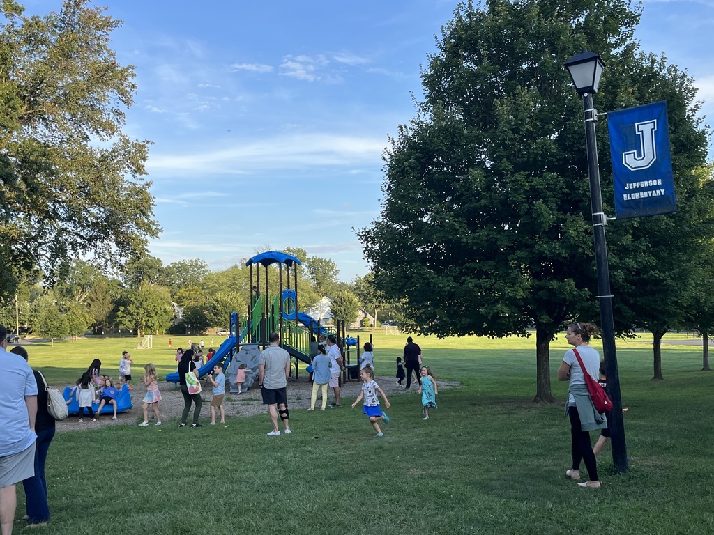 Students and families enjoying the nice evening out. 
