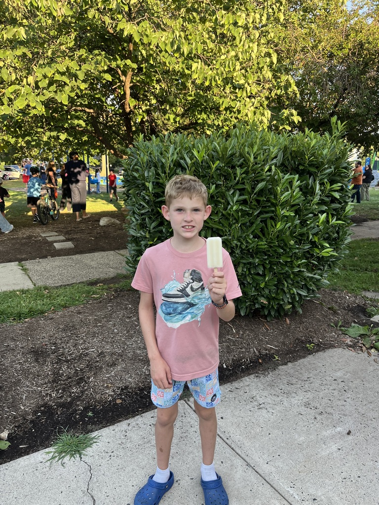 Student is happy with his ice pop choice - lime!