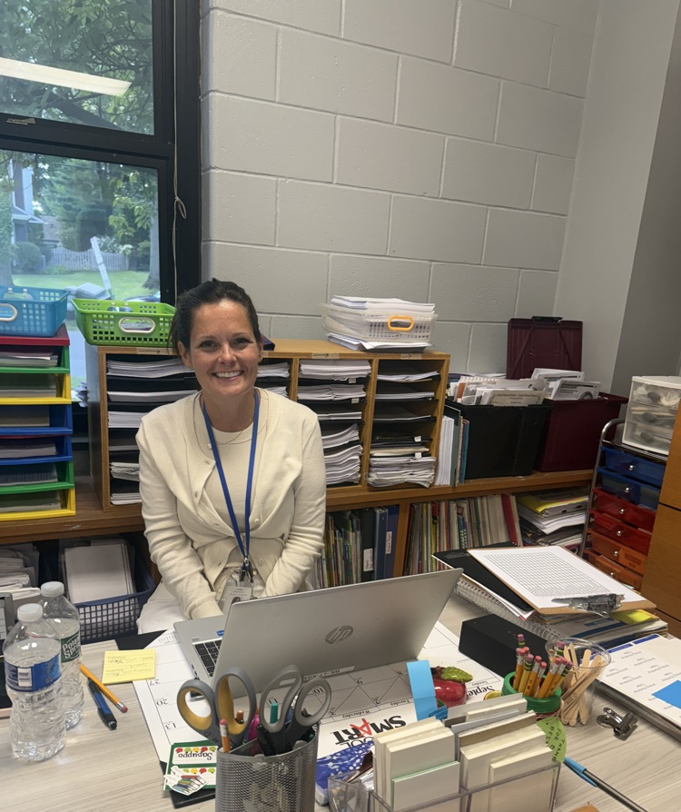 teacher organizing their classroom