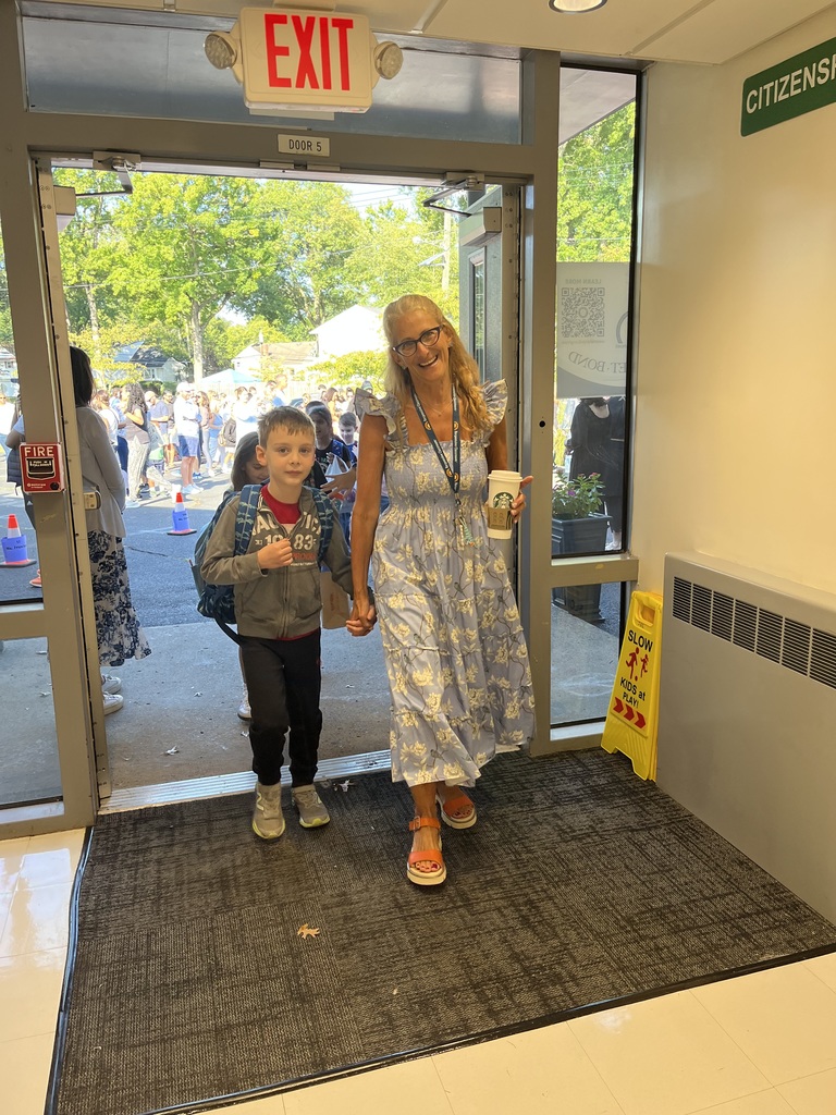 2nd grade teacher and student are ready for their day.