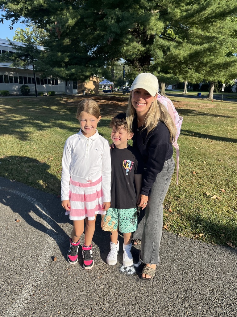 An excited new 3rd grader and her family