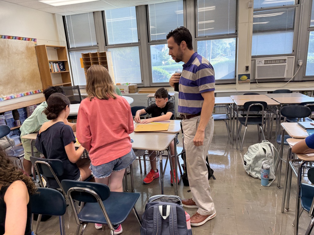 teacher talking to students