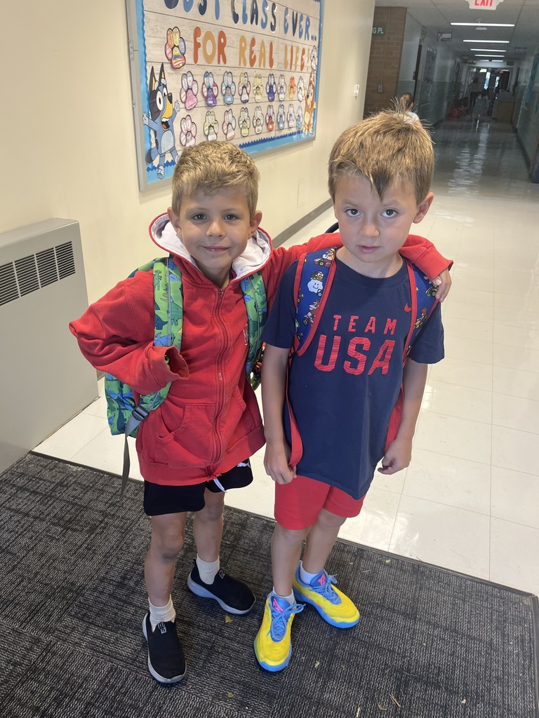 Two students dressed in their red, white and blue.