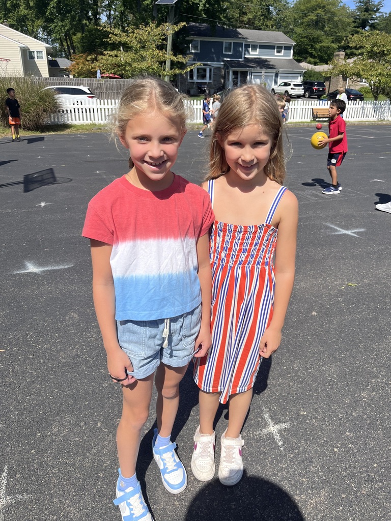 Two students dressed in their red, white and blue.