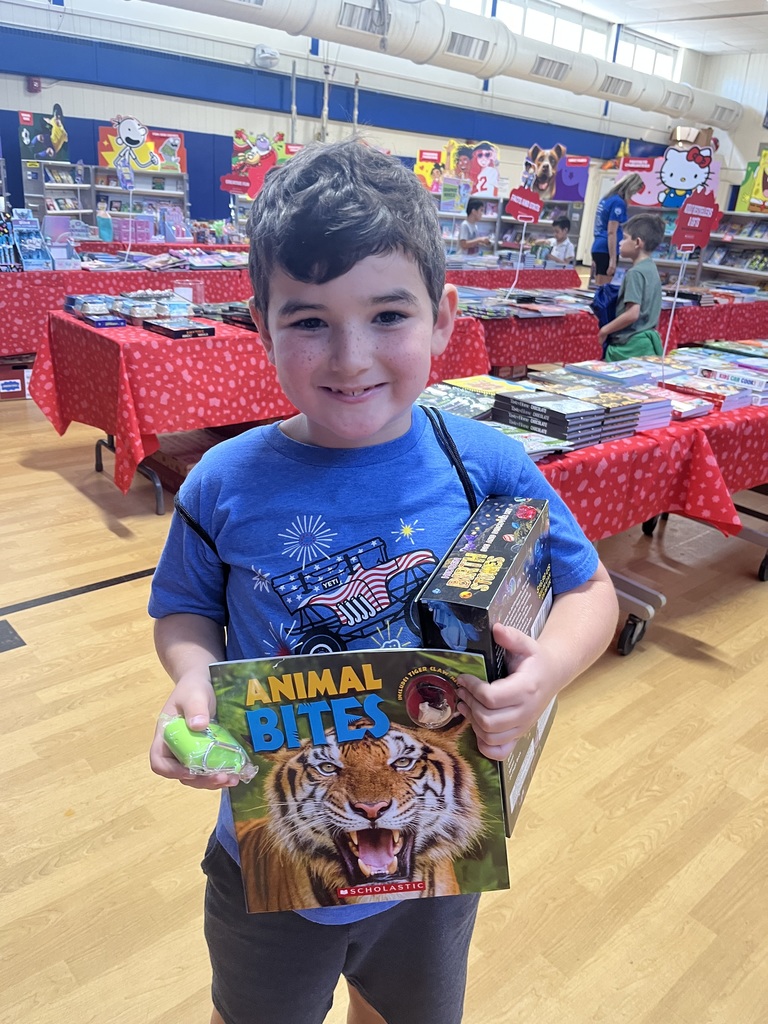 First grade is happy with his purchases.