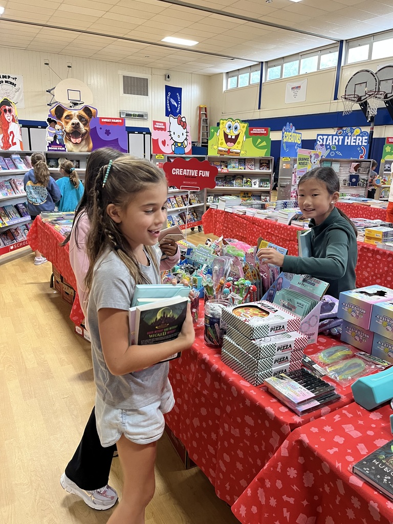 Fourth graders are enjoying the book fair.