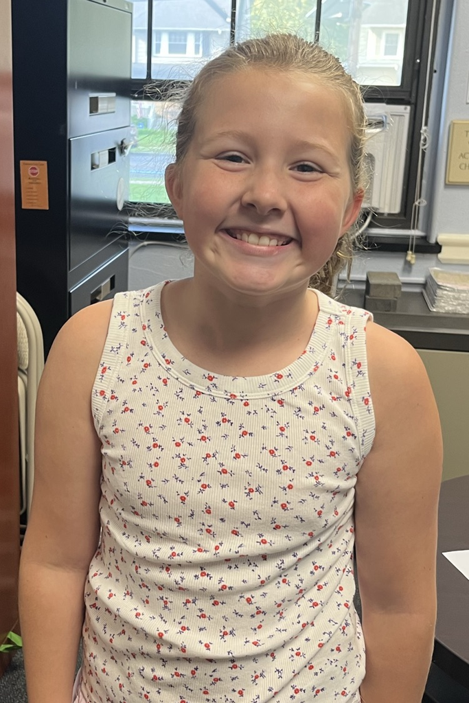 student reading announcement 