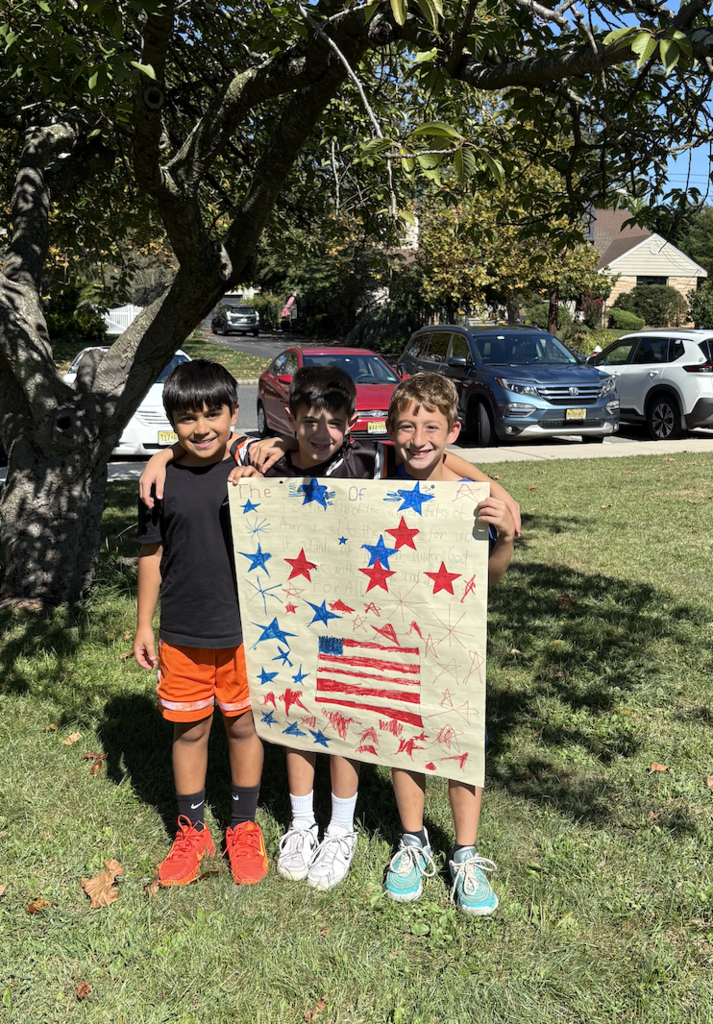 Students made poster for the Pledge of Allegiance.