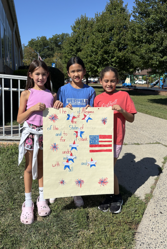 Students made poster for the Pledge of Allegiance.