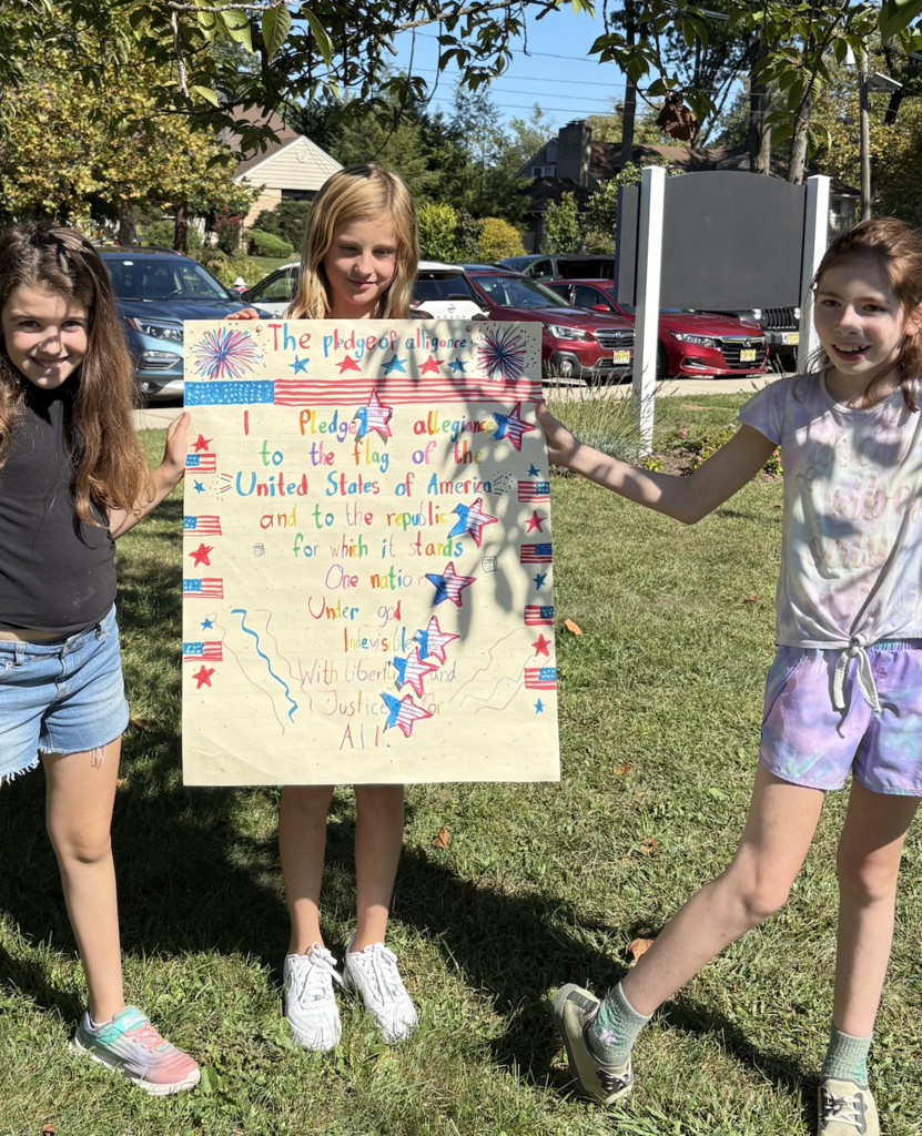Students made poster for the Pledge of Allegiance.