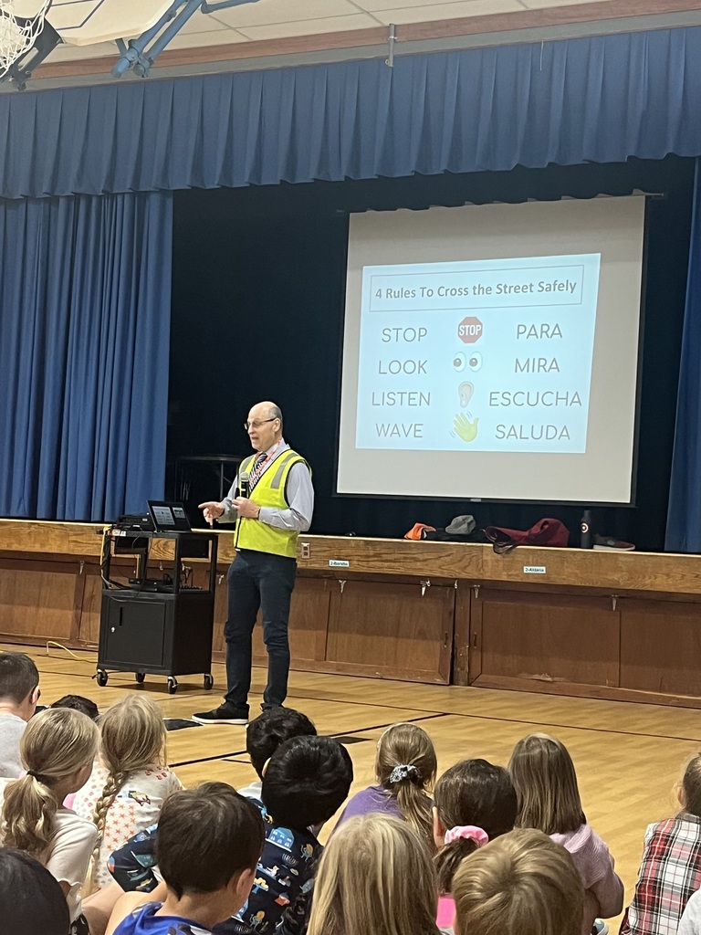 Presenter shares tips for walking and crossing streets safely.