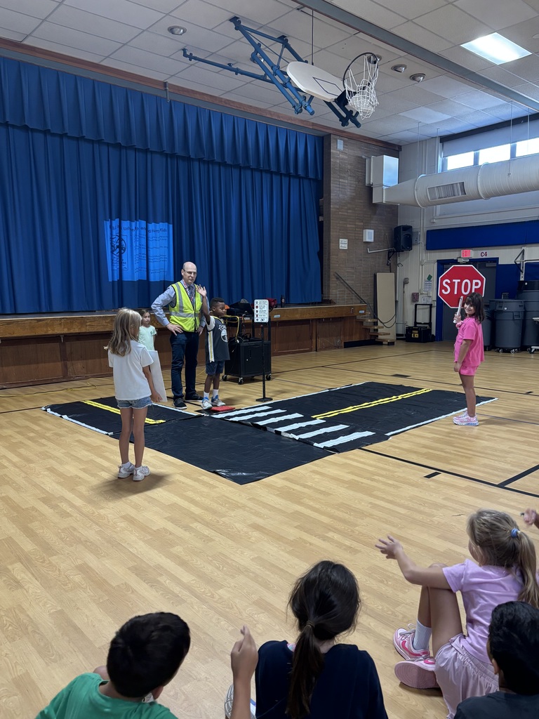 Students practicing how to cross safely.