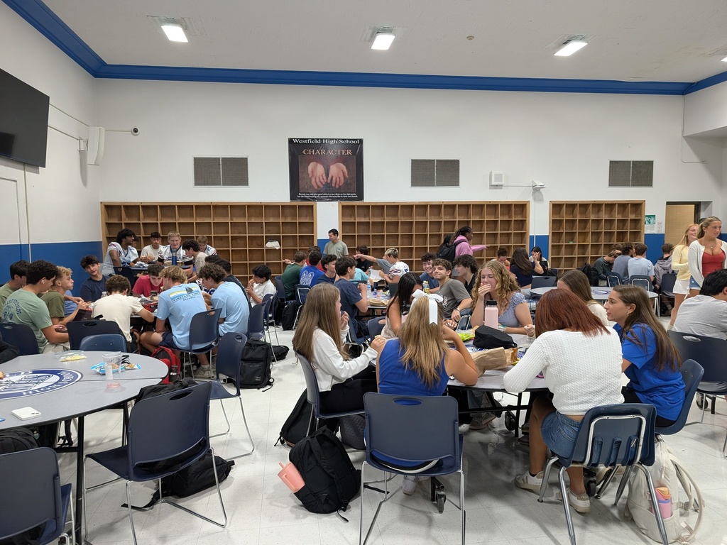 students eating in caf A