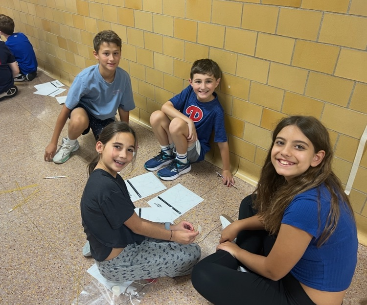 students working in a group on a design challenge