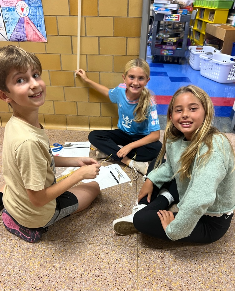 students working in a group on a design challenge