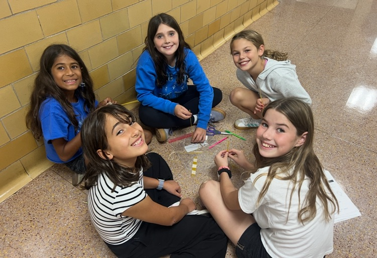 students working in a group on a design challenge