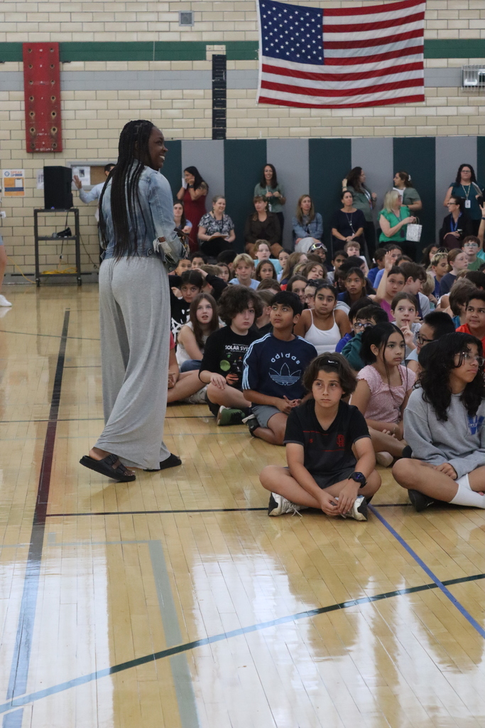 adult speaking on microphone