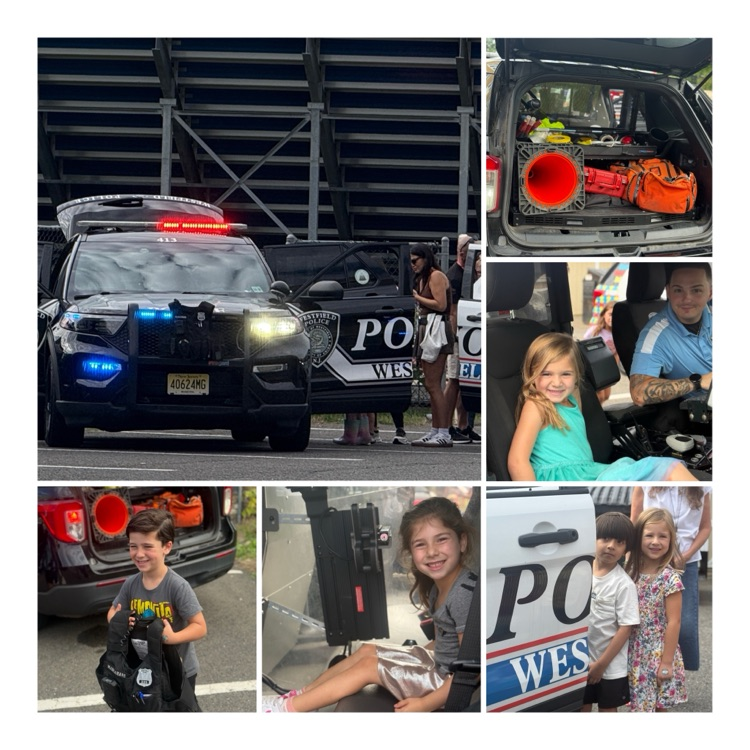 students engage with community helpers at Touch-a-Truck