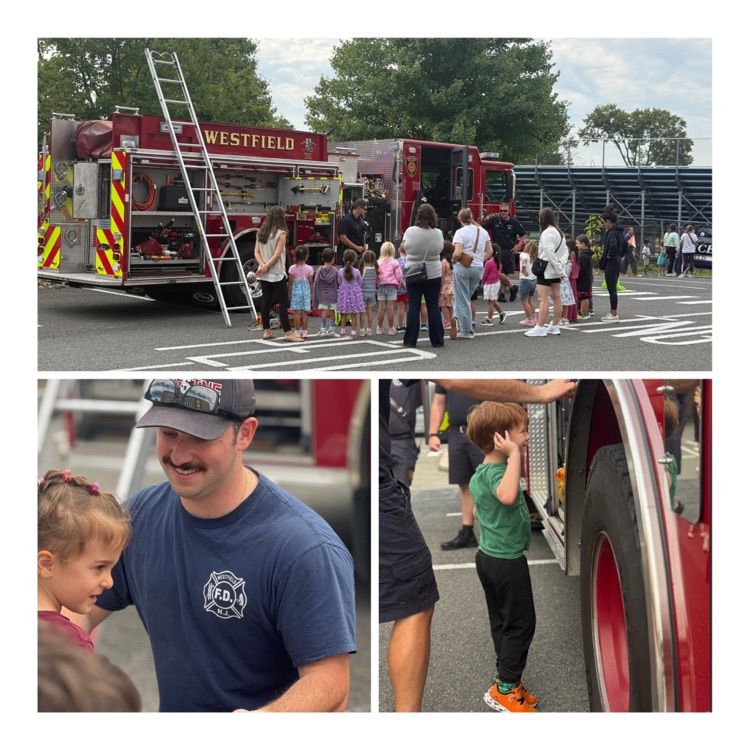 students engage with community helpers at Touch-A-Truck