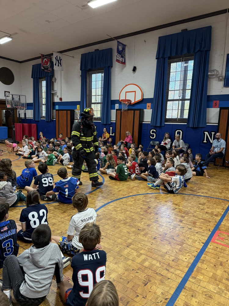 students watching fire safety presentation