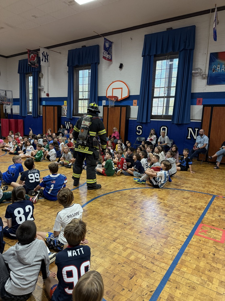 students watching fire safety presentation
