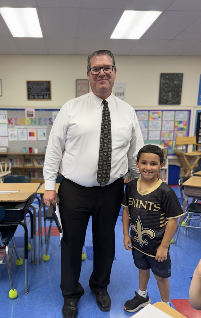 student and staff wearing sports gear