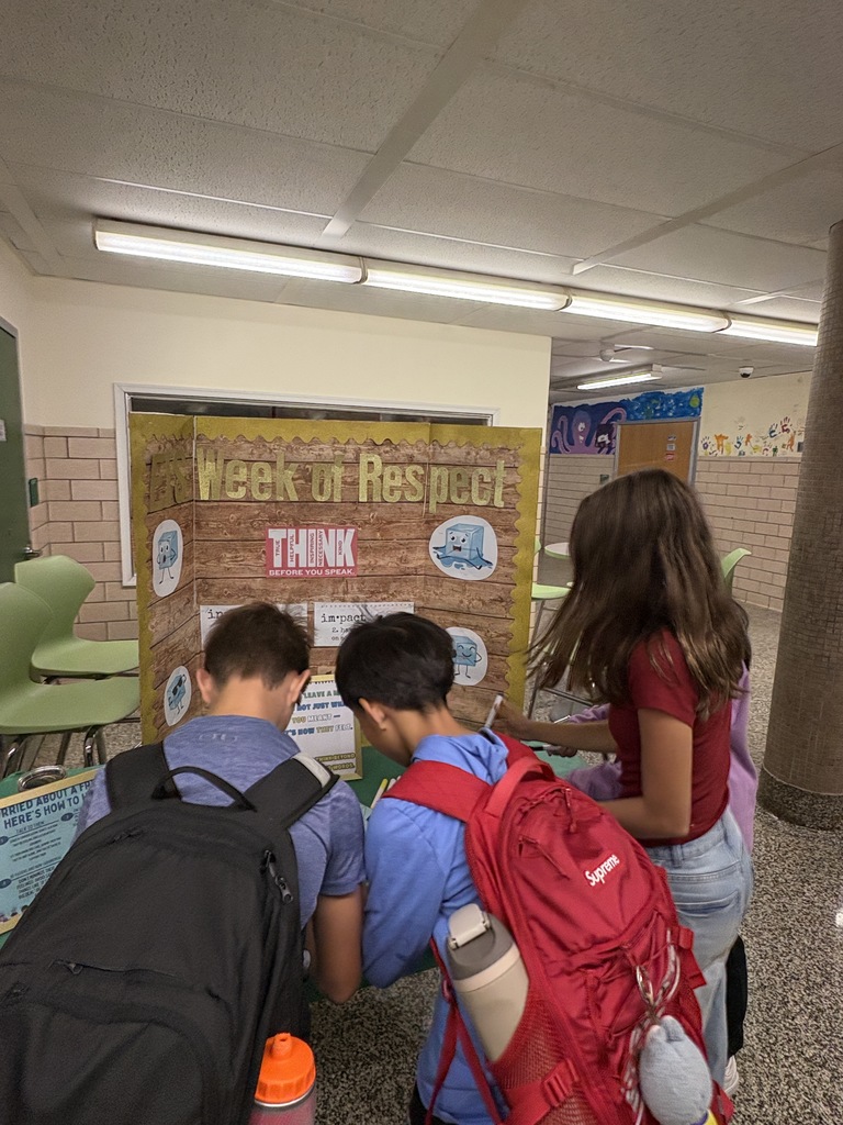 Students filling out icebreaker suggestions 